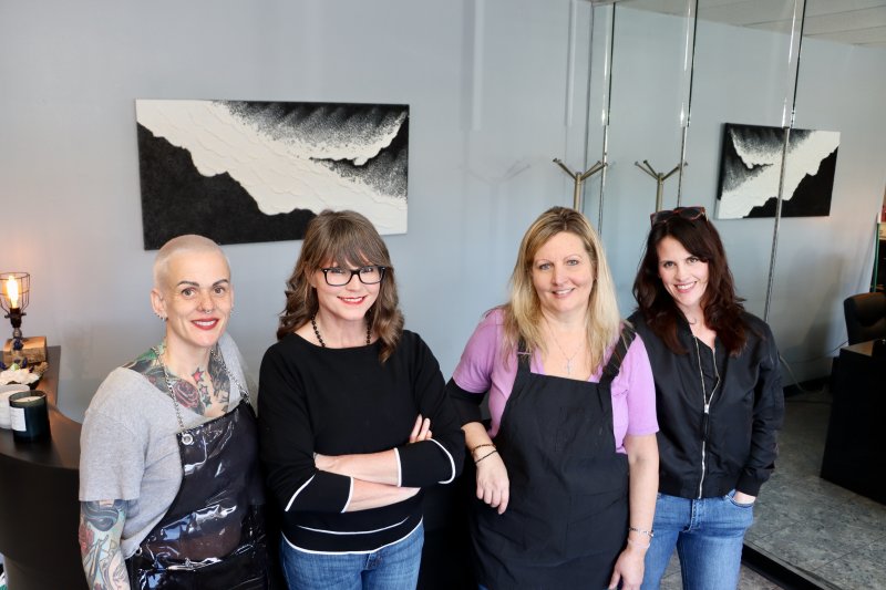 Christie DeMartin, owner of the Anchor & Iron Salon, hired the three barbers who were left out in the cold when the roof collapsed at the Barbershop at Peddler’s Village. Shown are (l-r) Destiny Childress, Christie DeMartin, Cathy Davis and Sarah Mangos.